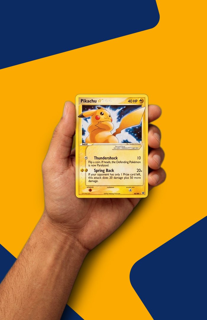 Hand holding a Pikachu Pokémon card